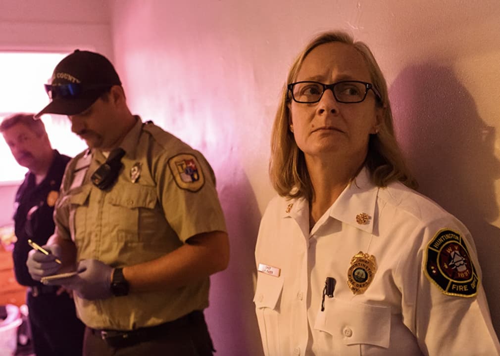 Police officers in hallway