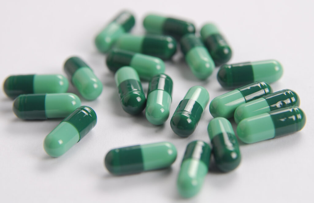 green capsule pills